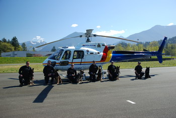 Police dogs with helicopter