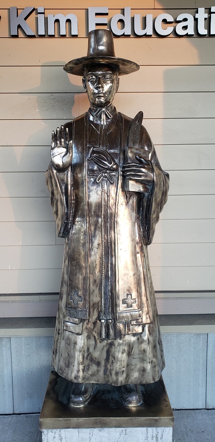 A two metres tall bronze statue that depicts St. Andrew Kim.  